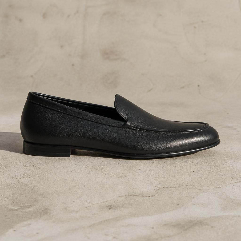 UNSTRCT women's loafer in black, side profile